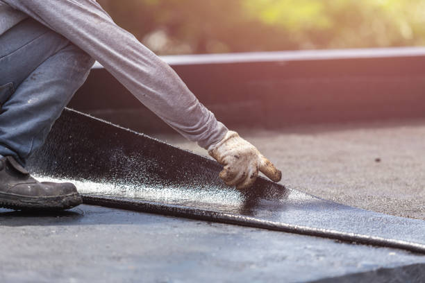 Professional Emergency Waterproofing technician working in Bayville, NJ